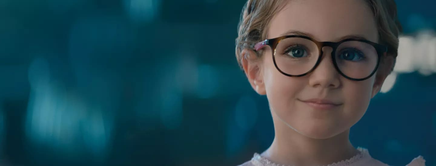 Child wearing Essilor Stellest lenses for myopia control in Abu Dhabi
